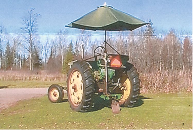 john deere patio umbrella Cornthwaite Group Automatic umbrella has a vented cover to resist inversion John Deere Sun Umbrella -