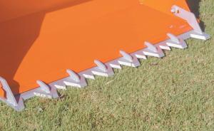 FARM SHOW - "Piranha" Tooth Bar Chews Up Dirt